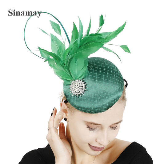 Satin Fascinator with Feather and Studded Broach